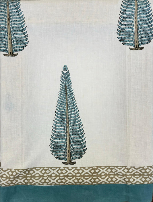 Stunning block-printed curtains on a crisp white cotton base with  blue palm