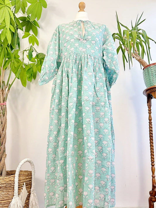 Elegant Block print Midi Dress stitched to be your next comfy dress this Summer in Pastel Oceania Aqua White Lotus Goddess Floral