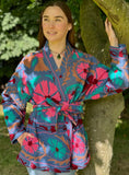 Traditional Suzani Belted Jacket – Hip-Length Elegance
Blue Hue