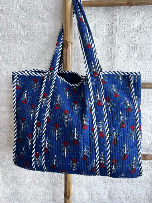Quilted Cotton Handprint Navy blue with small red flowers