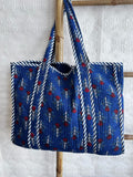 Quilted Cotton Handprint Navy blue with small red flowers