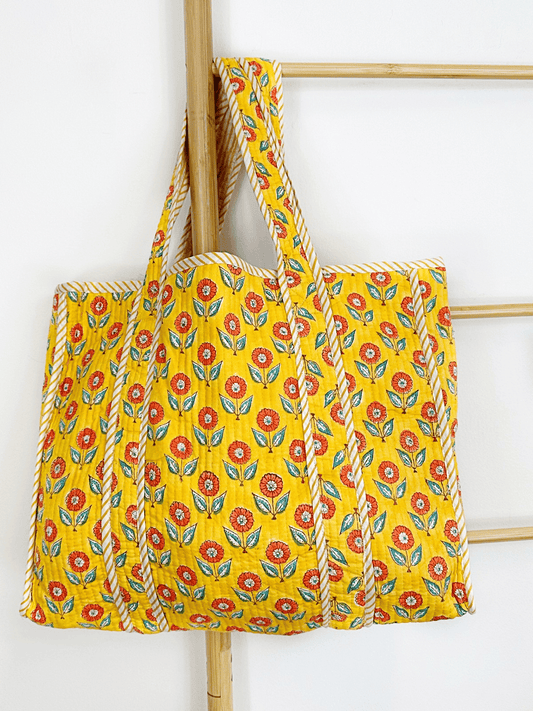 Quilted Cotton Handprint yellow with small orange flowers
