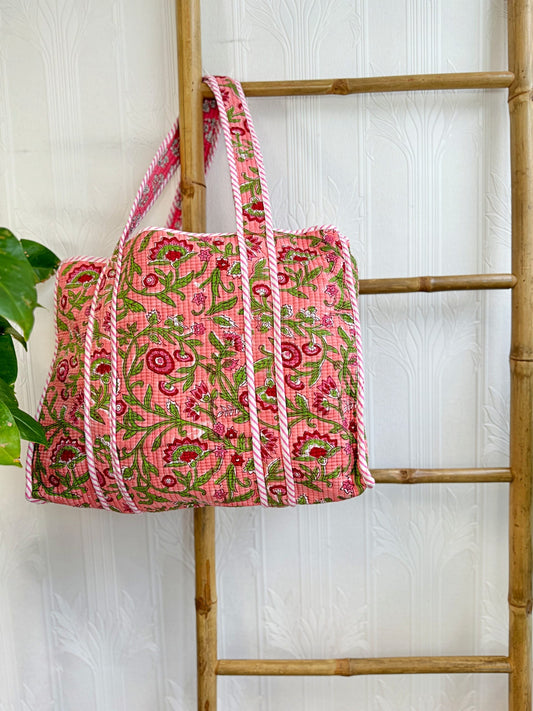 Quilted Cotton Handprint Peach with small red flowers