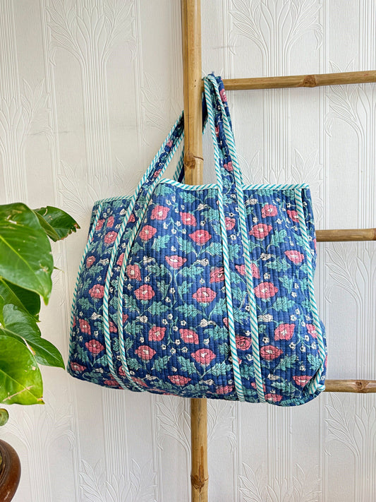 Quilted Cotton Handprint Blue with small pink flower and blue leaf