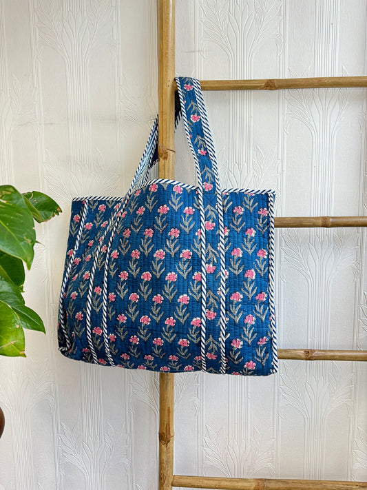 Quilted Cotton Handprint Navy blue with small pink flowers