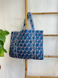 Quilted Cotton Handprint Navy blue with small pink flowers