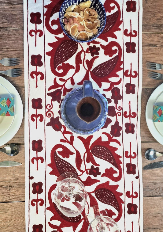 Bring your table to life with Suzani style red motif