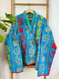 Vintage Suzani Jacket – Artisan Embroidery Meets Timeless Style Bright blue with red yellow