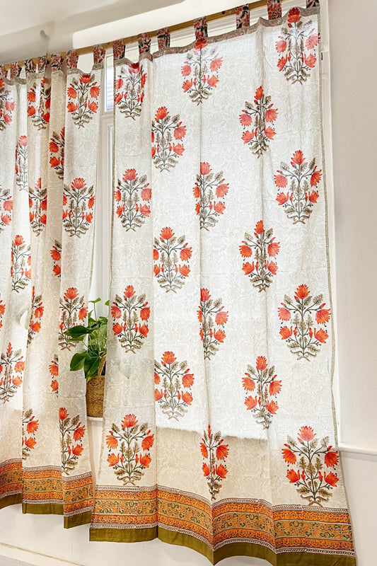 Stunning block-printed curtains on a crisp white cotton base with floral Orange